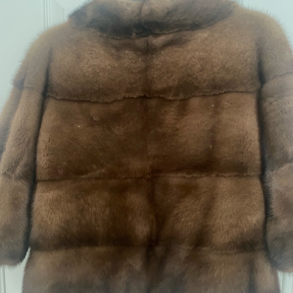 2 fur coats together